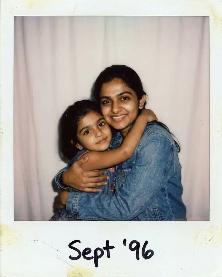 AI example of an instant photo of a woman hugging a child version of herself