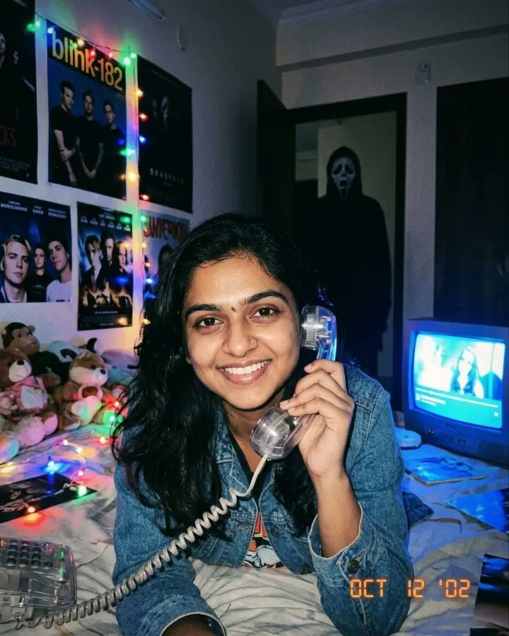 AI example of a Y2K bedroom selfie with a masked figure in the dark doorway